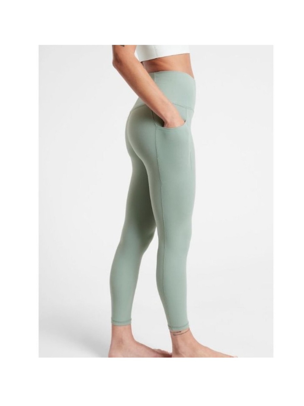 ATHLETA salutation stash II pocket 7/8 tights size M